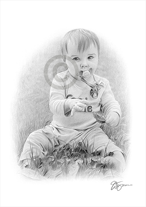 Portrait of a baby playing in the grass